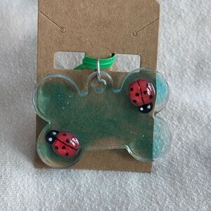Handcrafted Dog Bone Pendant with Ladybug Design